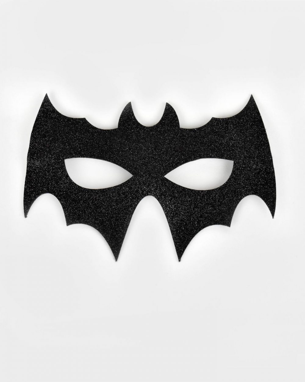 Svart glittrig batmanmask.